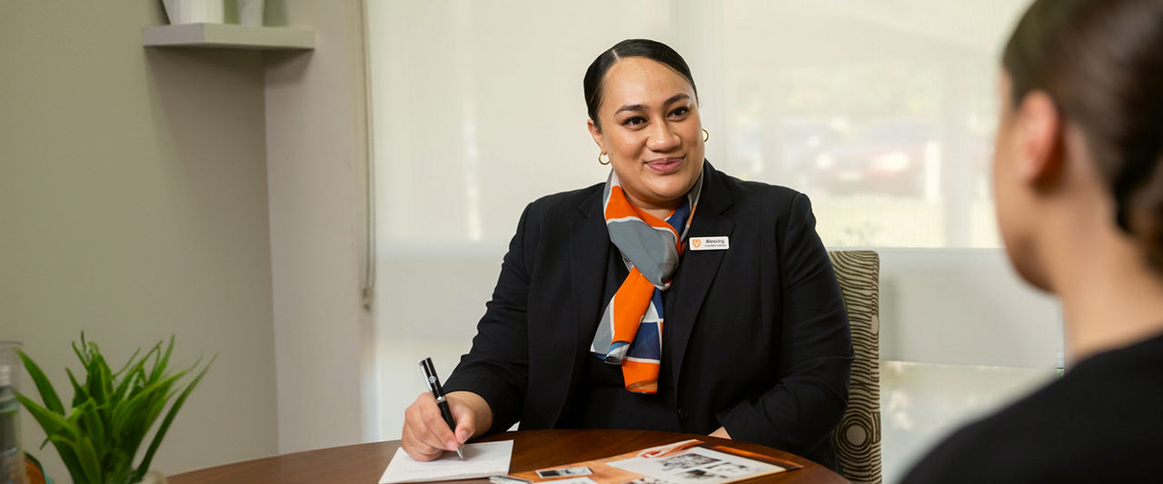 funeral director helping woman plan a funeral